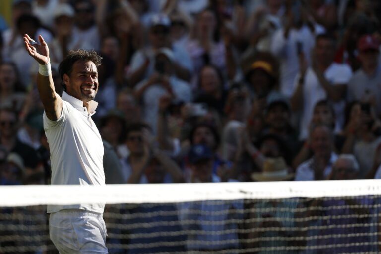 Fabio Fognini (ITA) waves to the crowd while leaving the court after his match against Carlos Alcaraz (ESP)(not pictured) in what is his final match at Wimbledon on day one of The Championships, Wimbledon 2025 at All England Lawn Tennis and Croquet Club.