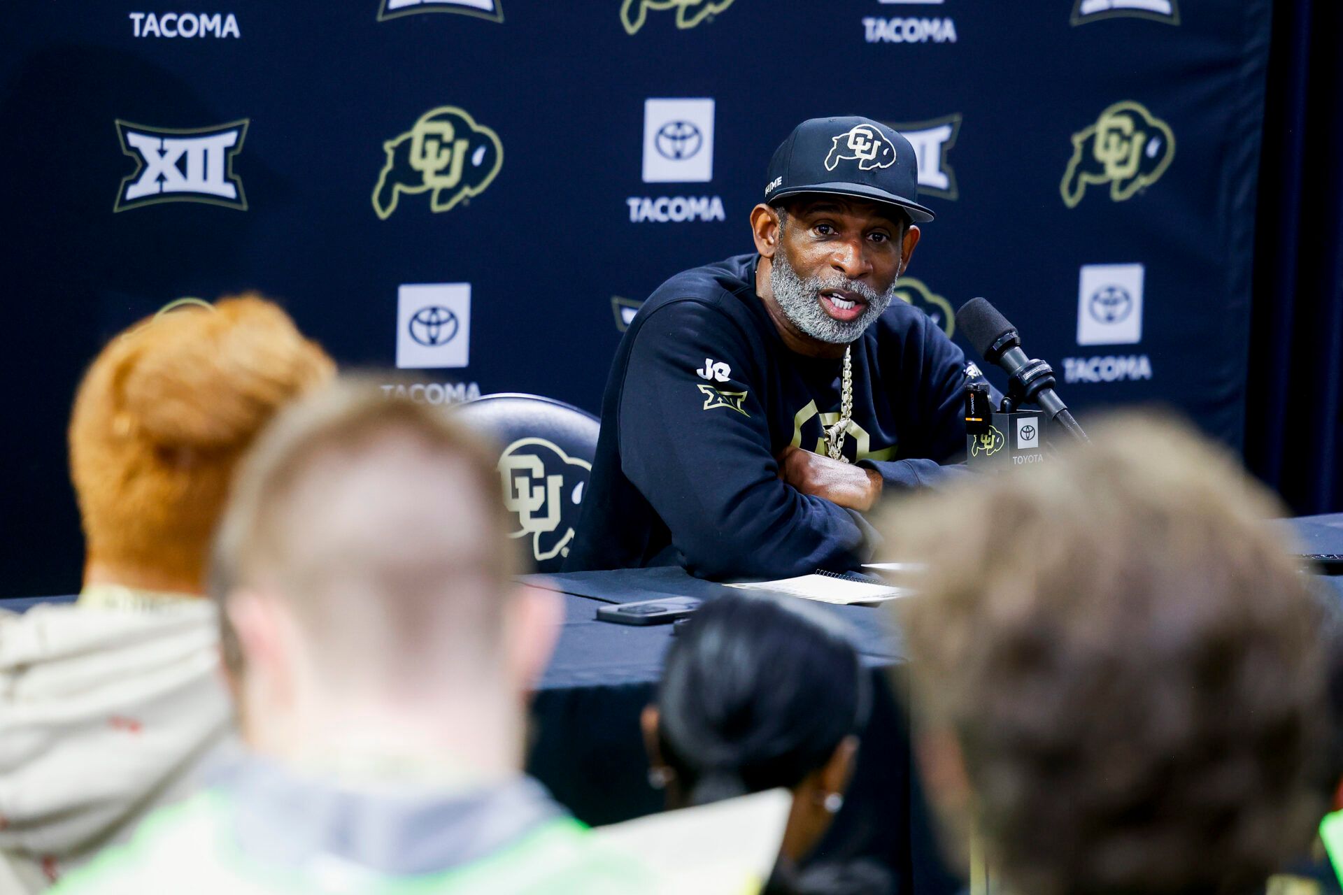 Colorado Buffaloes head coach Deion Sanders speaks to the media at the University of Colorado NFL Showcase at the CU Indoor Practice Facility.