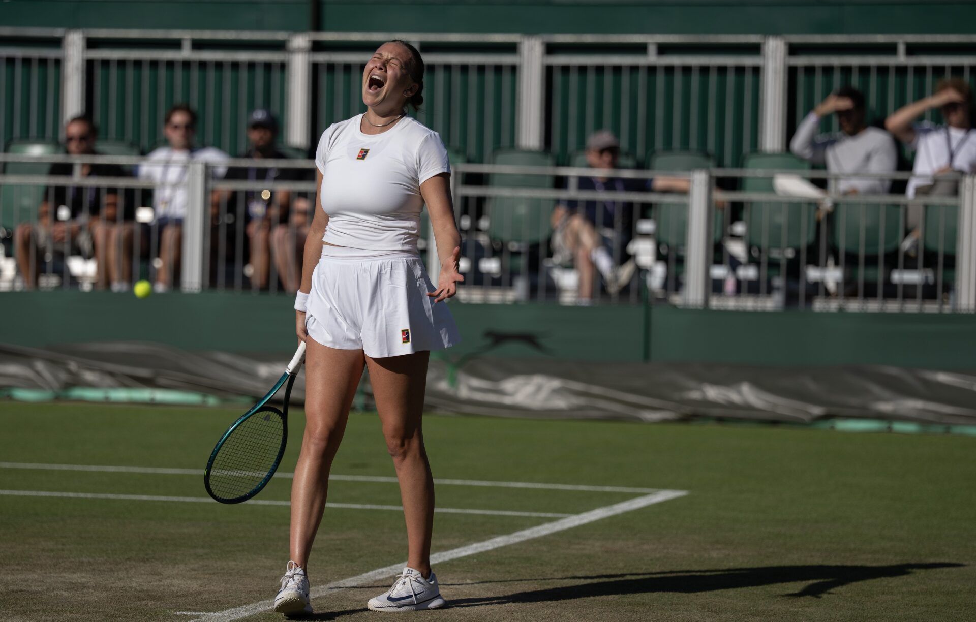 Amanda Anisimova of the United States reacts to a point during her match against Renata Zarazua of Mexico on day three at the All England Lawn Tennis and Croquet Club.