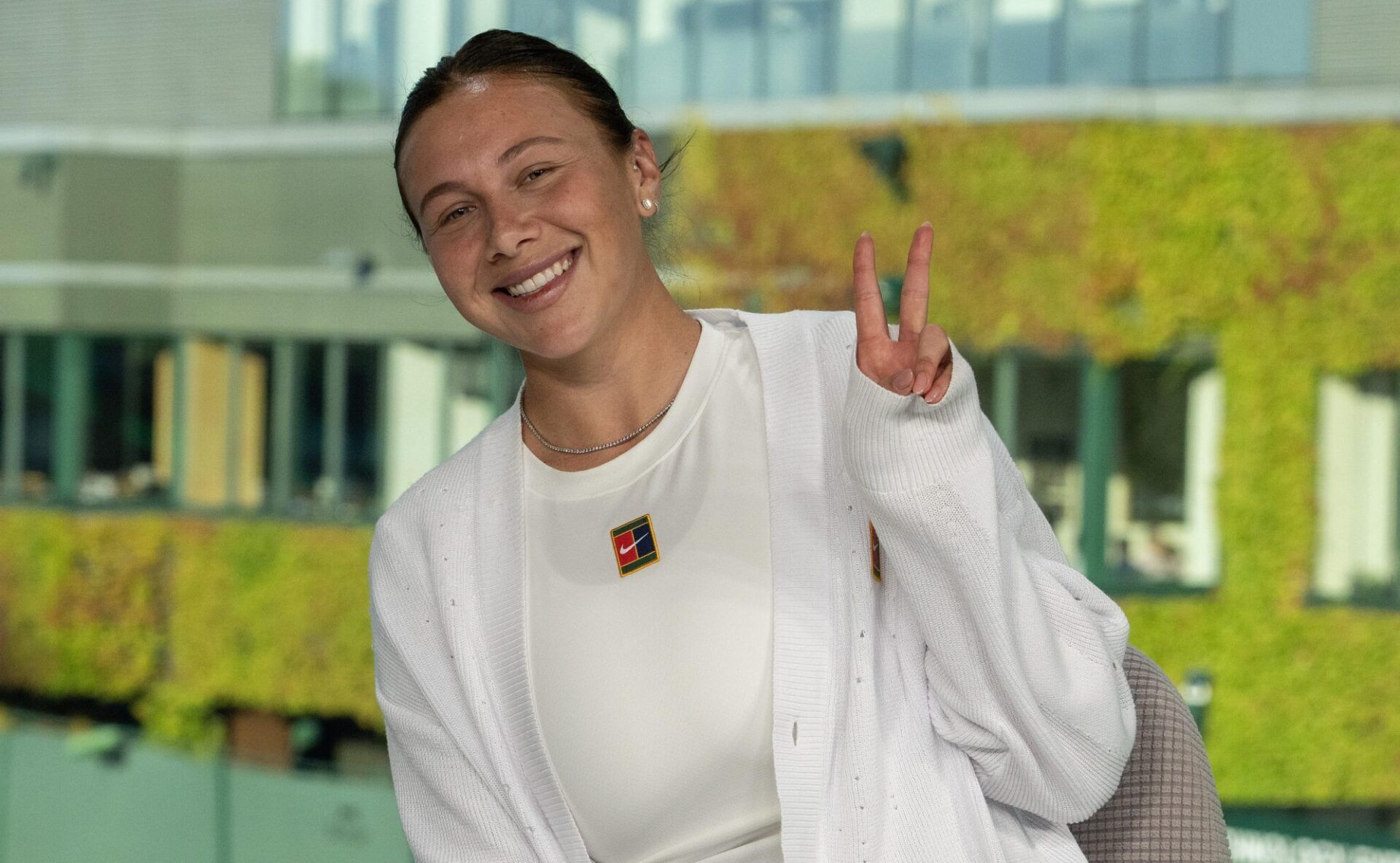 Amanda Anisimova of the United States on the Tennis Channel set after winning her match against Anastasia Pavlyuchenkova to earn a spot in the semi finals on day nine at All England Lawn Tennis and Croquet Club.