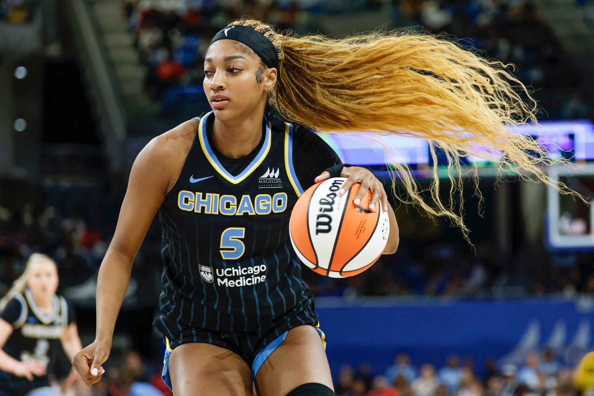Chicago Sky forward Angel Reese (5) drives to the basket against the Dallas Wings during the second half of a WNBA game at Wintrust Arena.
