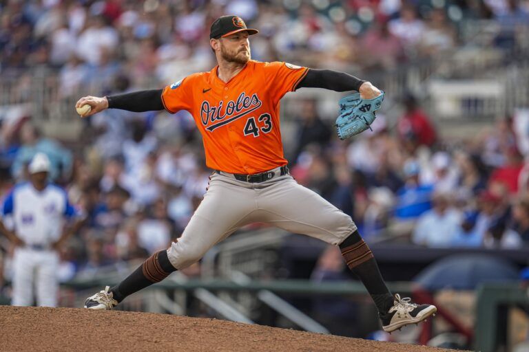 Baltimore Orioles relief pitcher Bryan Baker (43) pitches against the Atlanta Braves during the eighth inning at Truist Park.