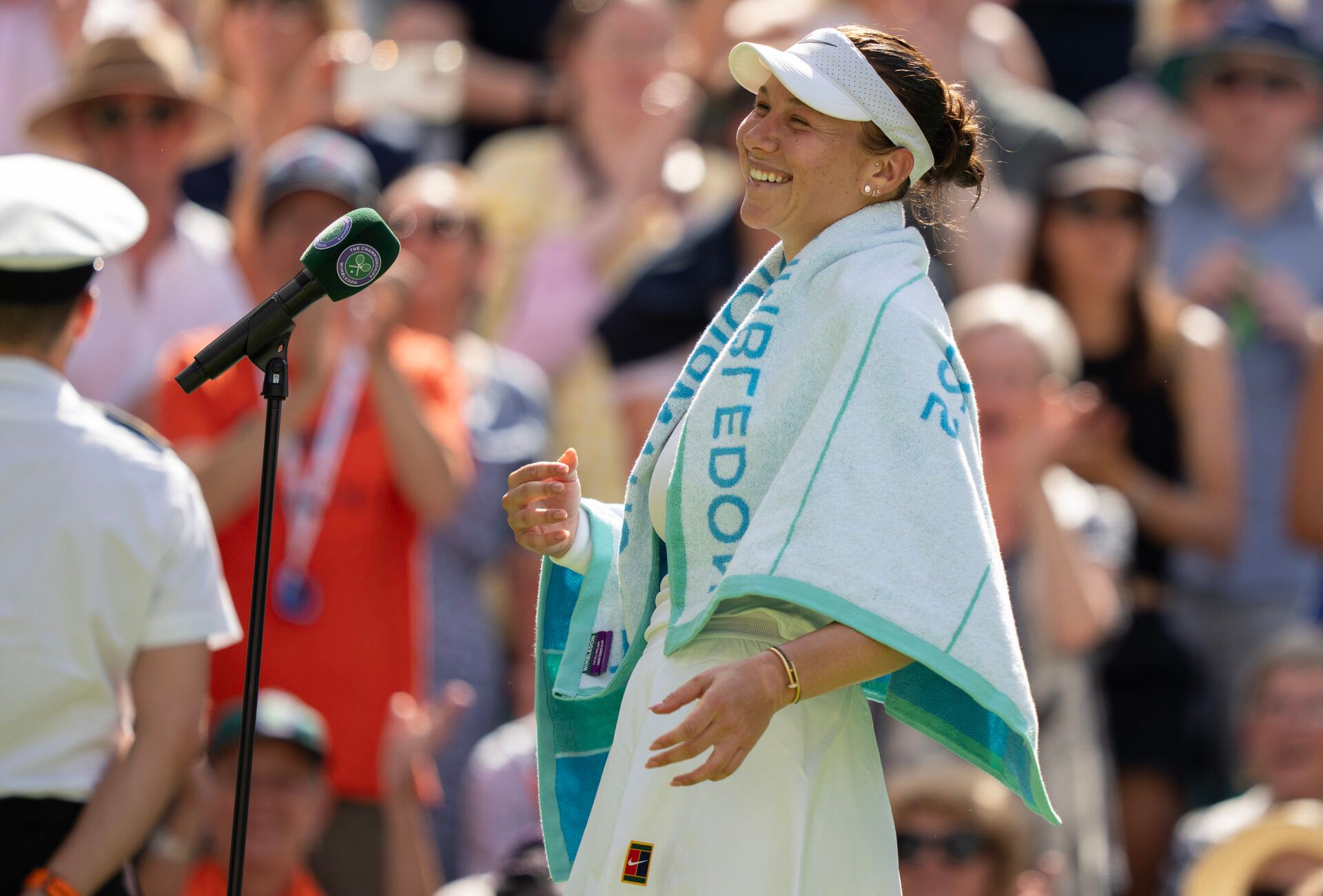 Amanda Anisimova of the United States at her interview on court after her match against Aryna Sabalenka on day 11 at All England Lawn Tennis and Croquet Club.