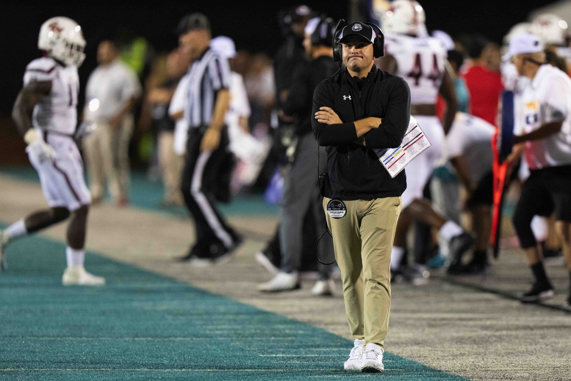 Gardner-Webb Runnin Bulldogs head coach Tre Lamb walks the side lines in a game against the Coastal Carolina Chanticleers at Brooks Stadium.