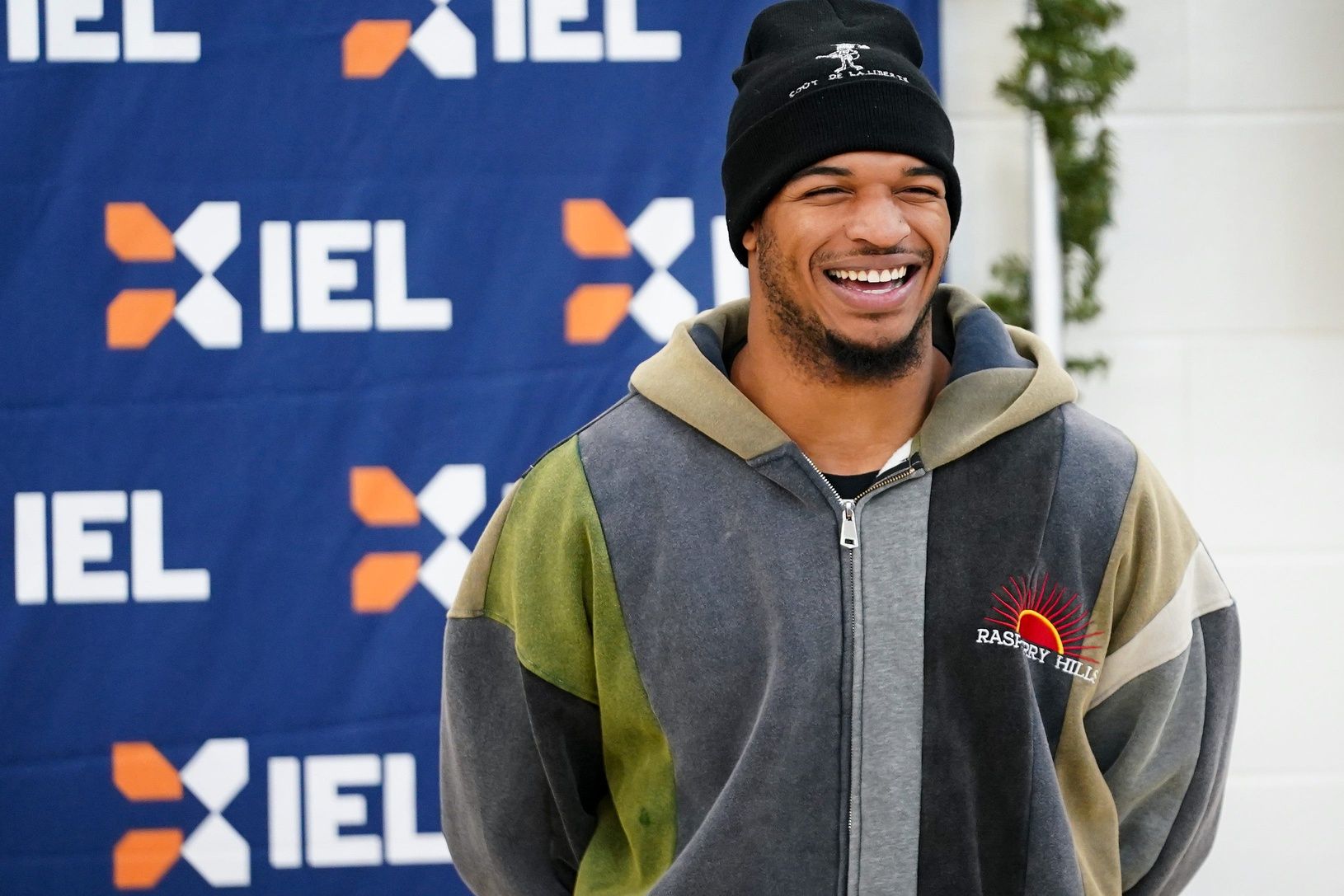 Cincinnati Bengals wide receiver Ja’Marr Chase smiles at a crowd of children during a Christmas shopping event, Tuesday, Dec. 3, 2024, at Dudley S. Taft Boys & Girls Club in Avondale.