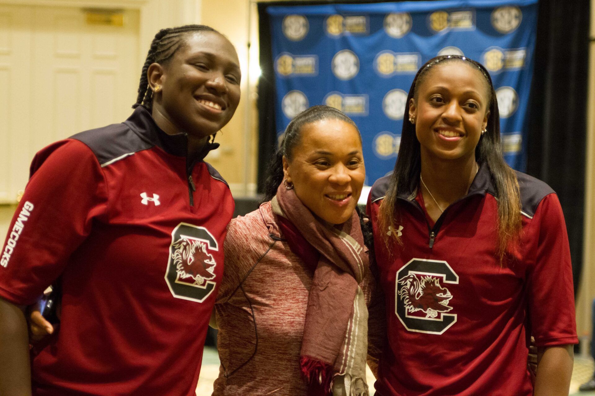 South Carolina Gamecocks player Aleighsha Welch, head coach Dawn Staley, and player Tiffany Mitchell pose for a picture during the SEC media day held at the Ballantyne Hotel.