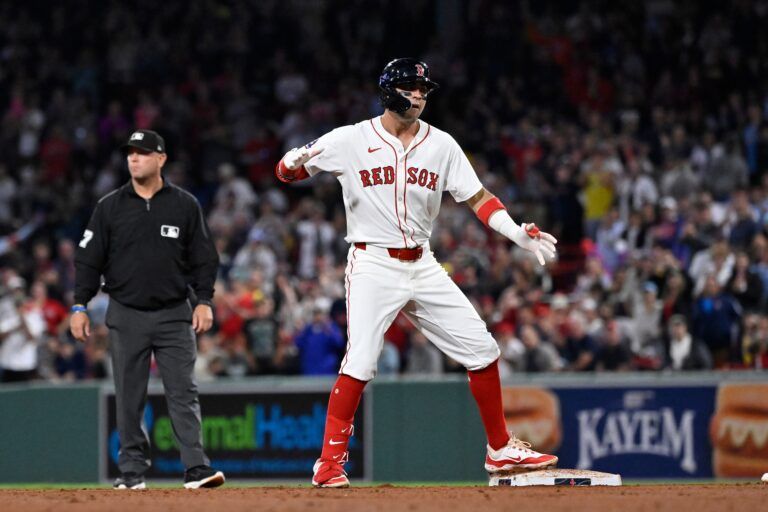Boston Red Sox third baseman Marcelo Mayer (39) reacts to hitting a one run RBI against the Tampa Bay Rays during the seventh inning at Fenway Park.