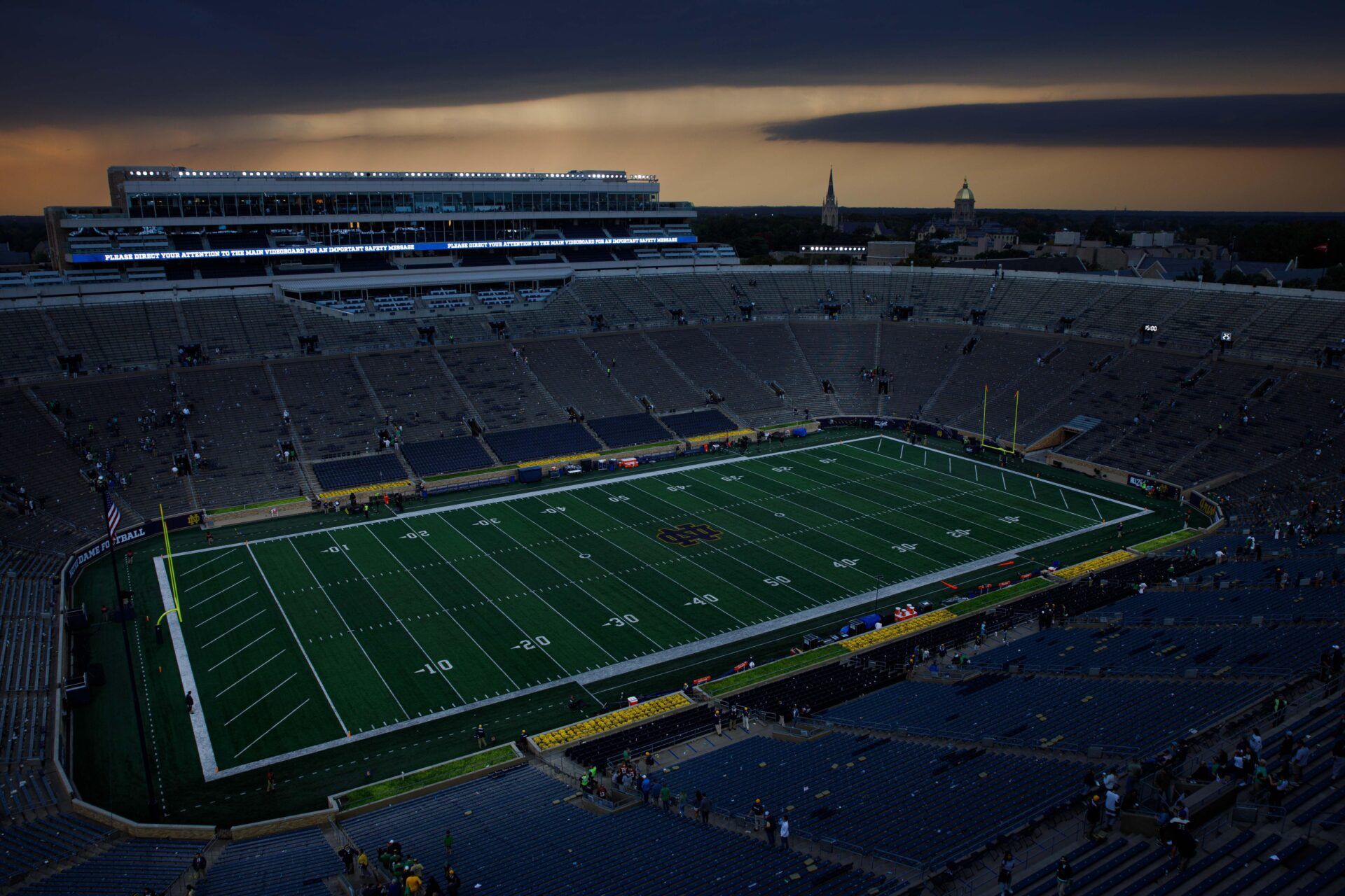 Fans evacuate after a NCAA college football game between Notre Dame and Stanford was suspended for lightning in the area at Notre Dame Stadium on Saturday, Oct. 12, 2024, in South Bend.