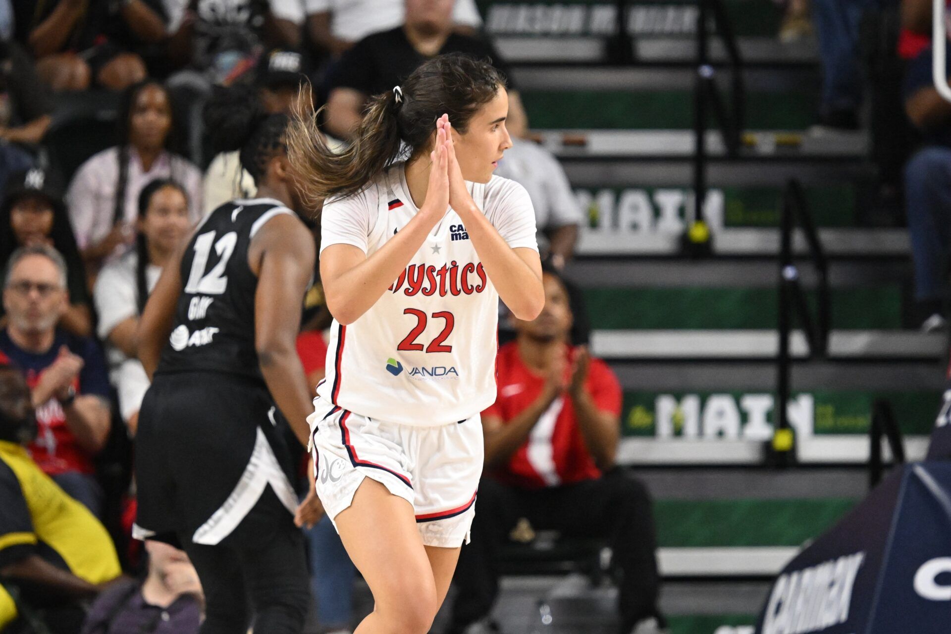 Washington Mystics guard Sonia Citron (22) reacts after scoring a basket against the Las Vegas Aces during the fourth quarter at EagleBank Arena.