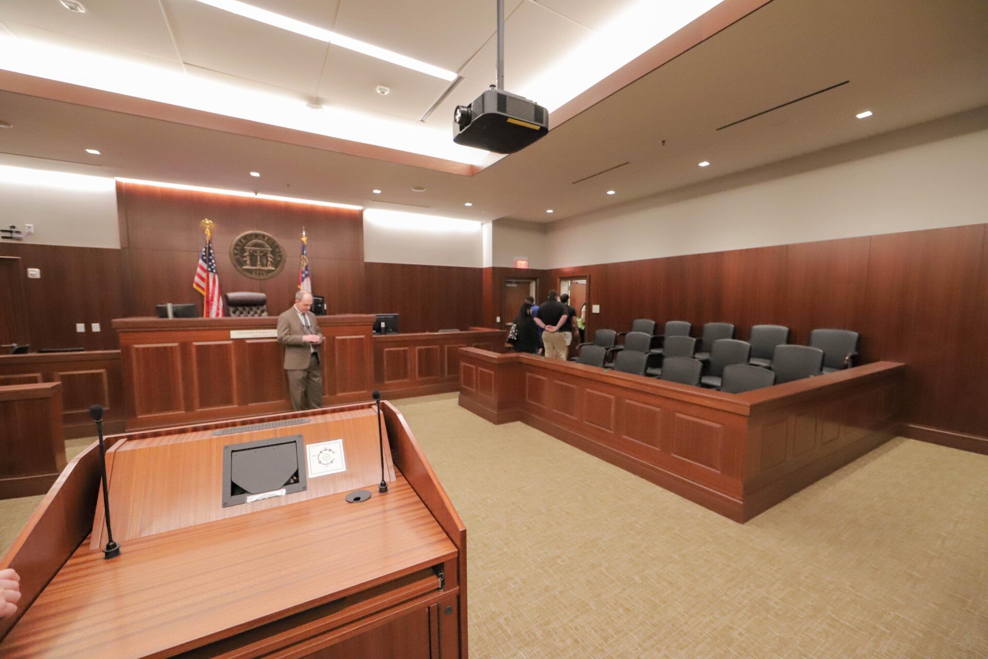 The jurors box and Judge's bench inside a State Court courtroom during a tour of the new Chatham County Judicial Complex Eugene H. Gadsden Courthouse on Friday, April 18, 2025.