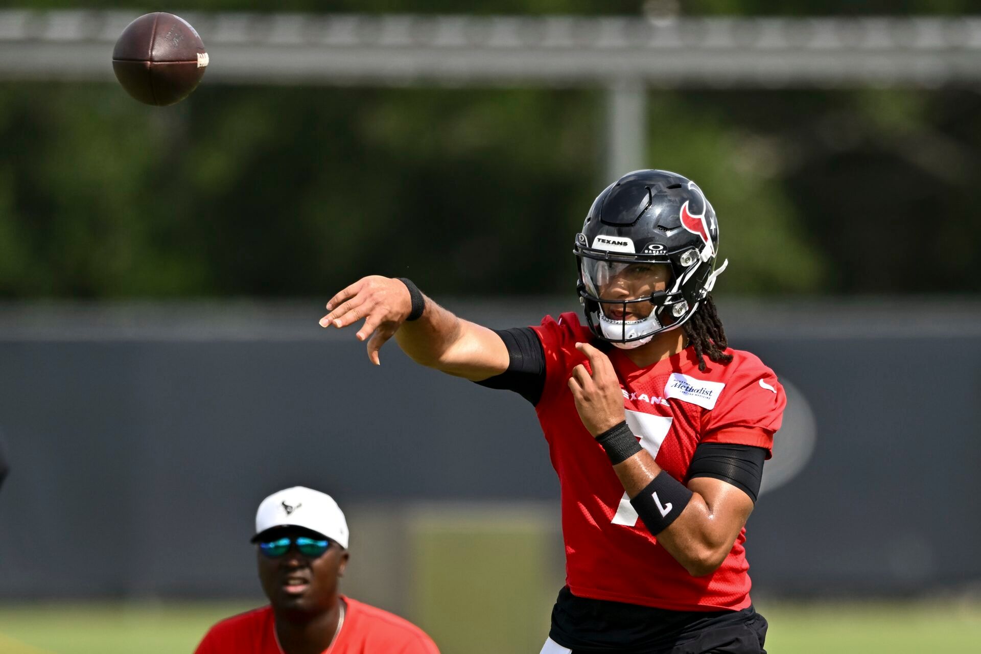 Houston Texans quarterback C.J. Stroud (7) participates in a drill during an NFL football minicamp at NRG Stadium.