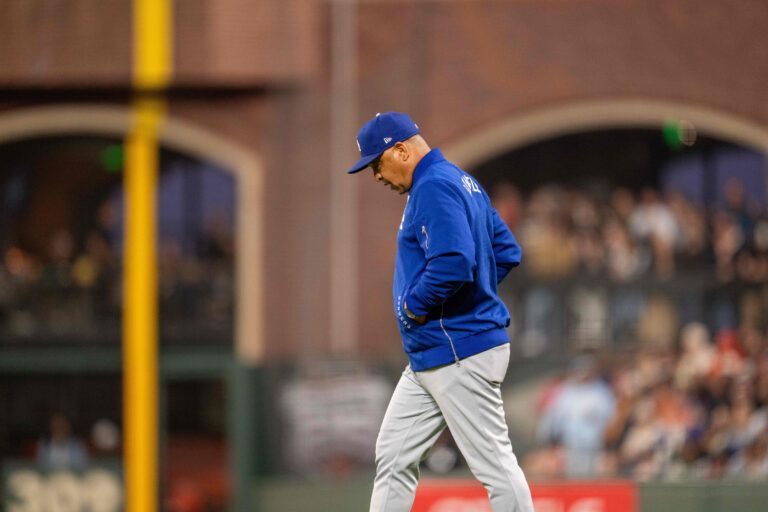 Los Angeles Dodgers manager Dave Roberts (30) goes to the mound during the fifth inning against the San Francisco Giants at Oracle Park.