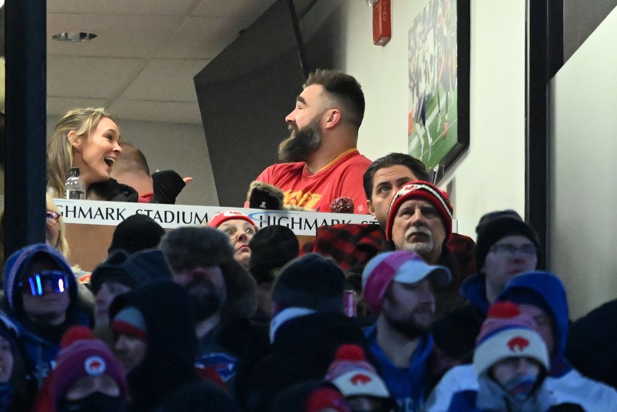 Jason Kelce (right) and Kylie Kelce (left) watch the game from the suites in the first half of the 2024 AFC divisional round game between the Buffalo Bills and the Kansas City Chiefs at Highmark Stadium.