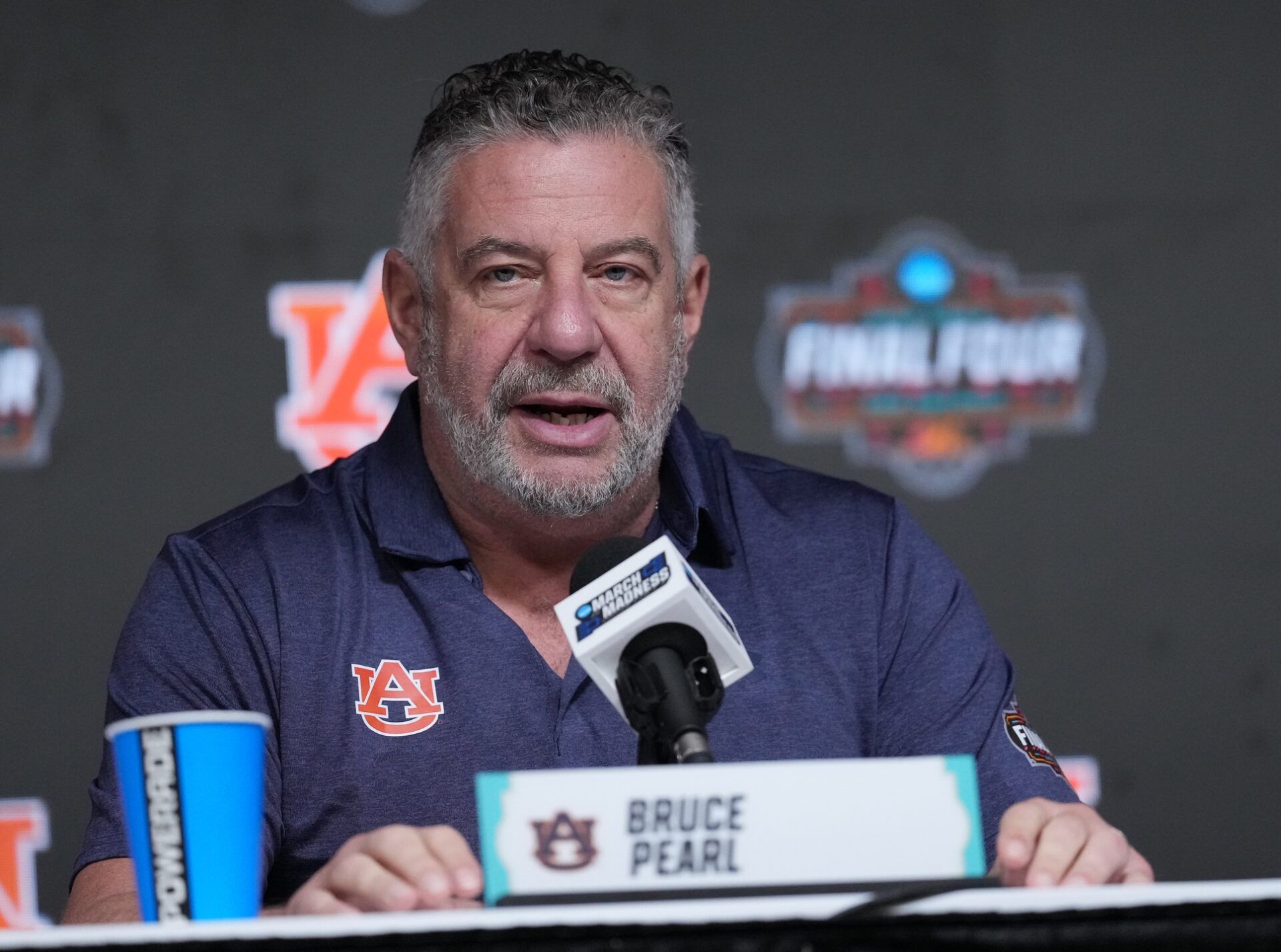 Auburn head coach Bruce Pearl talks to the media at the Alamodome.