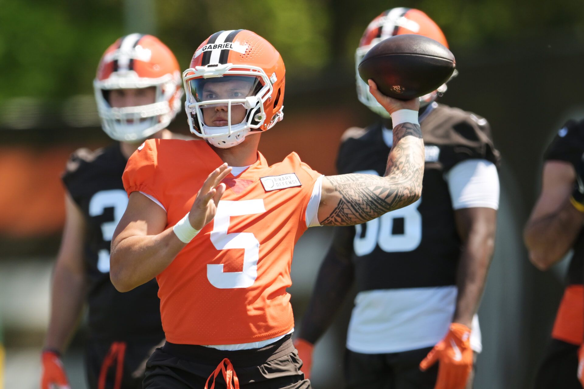 Cleveland Browns quarterback Dillon Gabriel (5) throws a pass during rookie minicamp at CrossCountry Mortgage Campus.