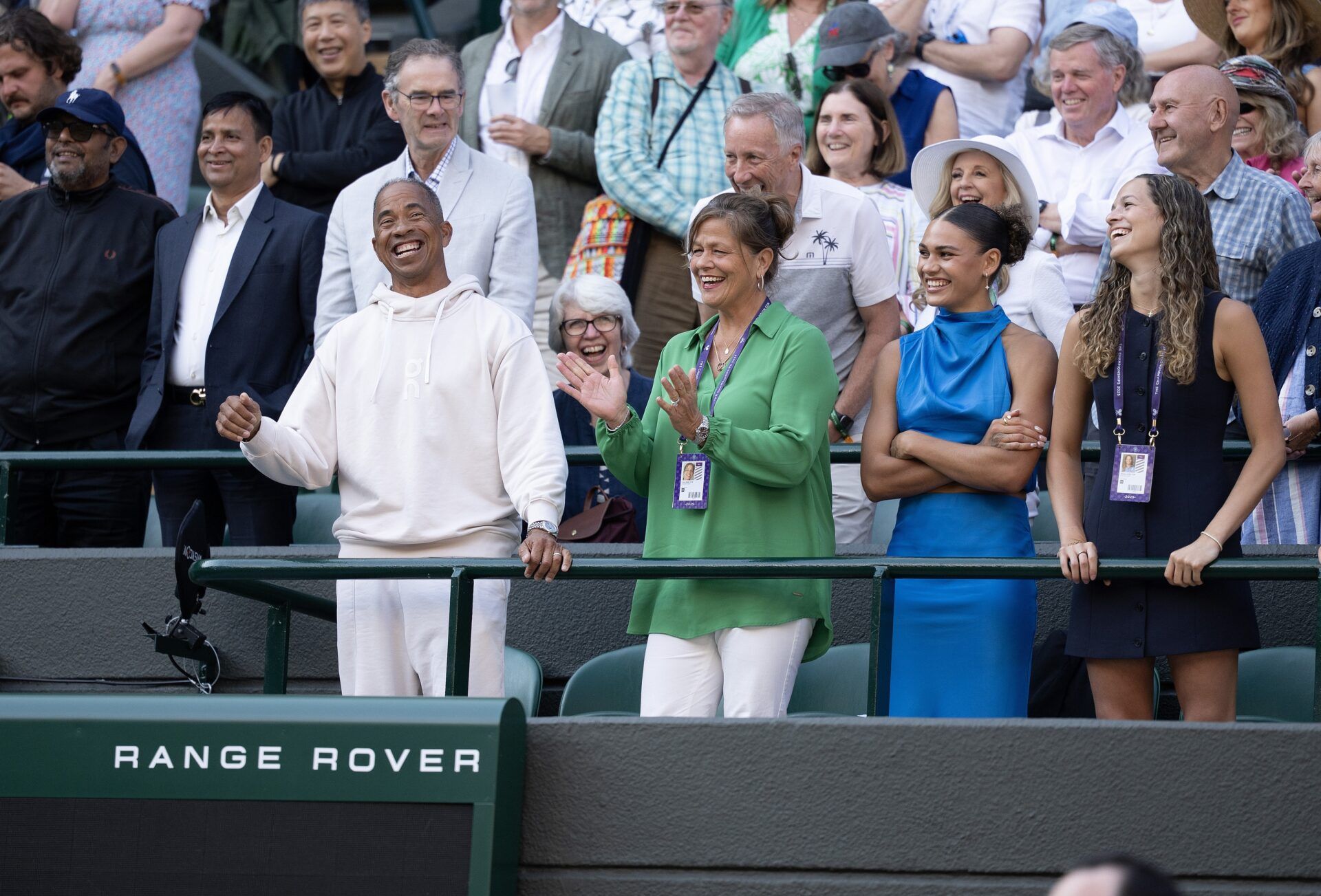 (l to r) Bryan Shelton, Lisa Shelton, Trinity Rodman and Emma Shelton react to Ben Shelton of the United States in his interview after winning his match against Lorenzo Sonego of Italy on day eight at All England Lawn Tennis and Croquet Club.