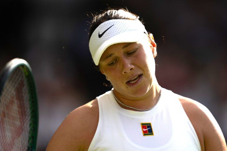 Iga Swiatek of Poland reacts to a point during the women’s final match against Amanda Anisimova of the United States on day 13 at All England Lawn Tennis and Croquet Club.