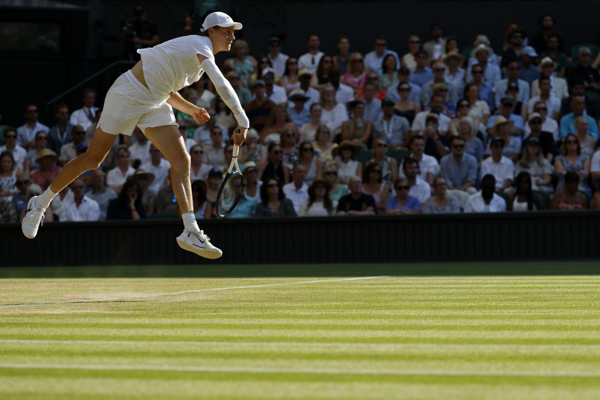 Jannik Sinner (ITA) serves against Novak Djokovic (SRB)(not pictured) in a gentlemen's singles semi-final on day twelve of The Championships Wimbledon 2025 at All England Lawn Tennis and Croquet Club.