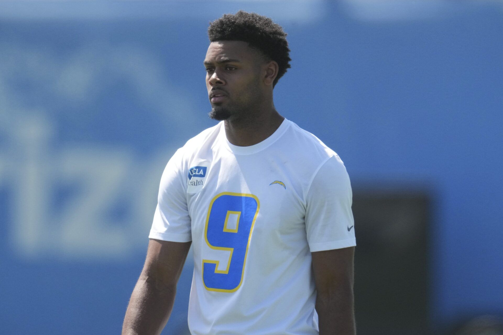 Los Angeles Chargers receiver Tre Harris (9) looks on during offseason workouts at The Bolt.