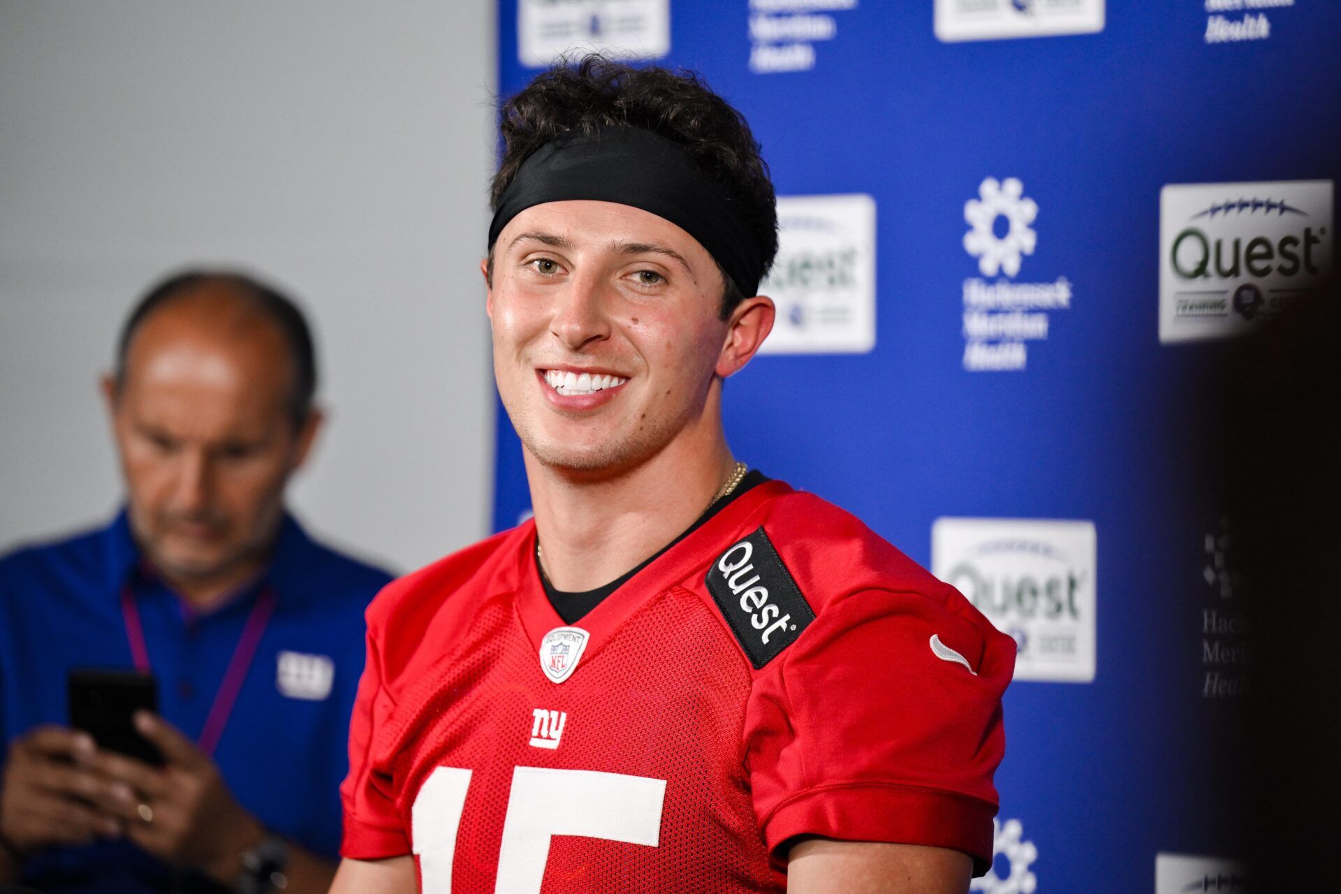 New York Giants quarterback Tommy DeVito (15) speaks at a press conference during minicamp at Quest Diagnostics Training Center.
