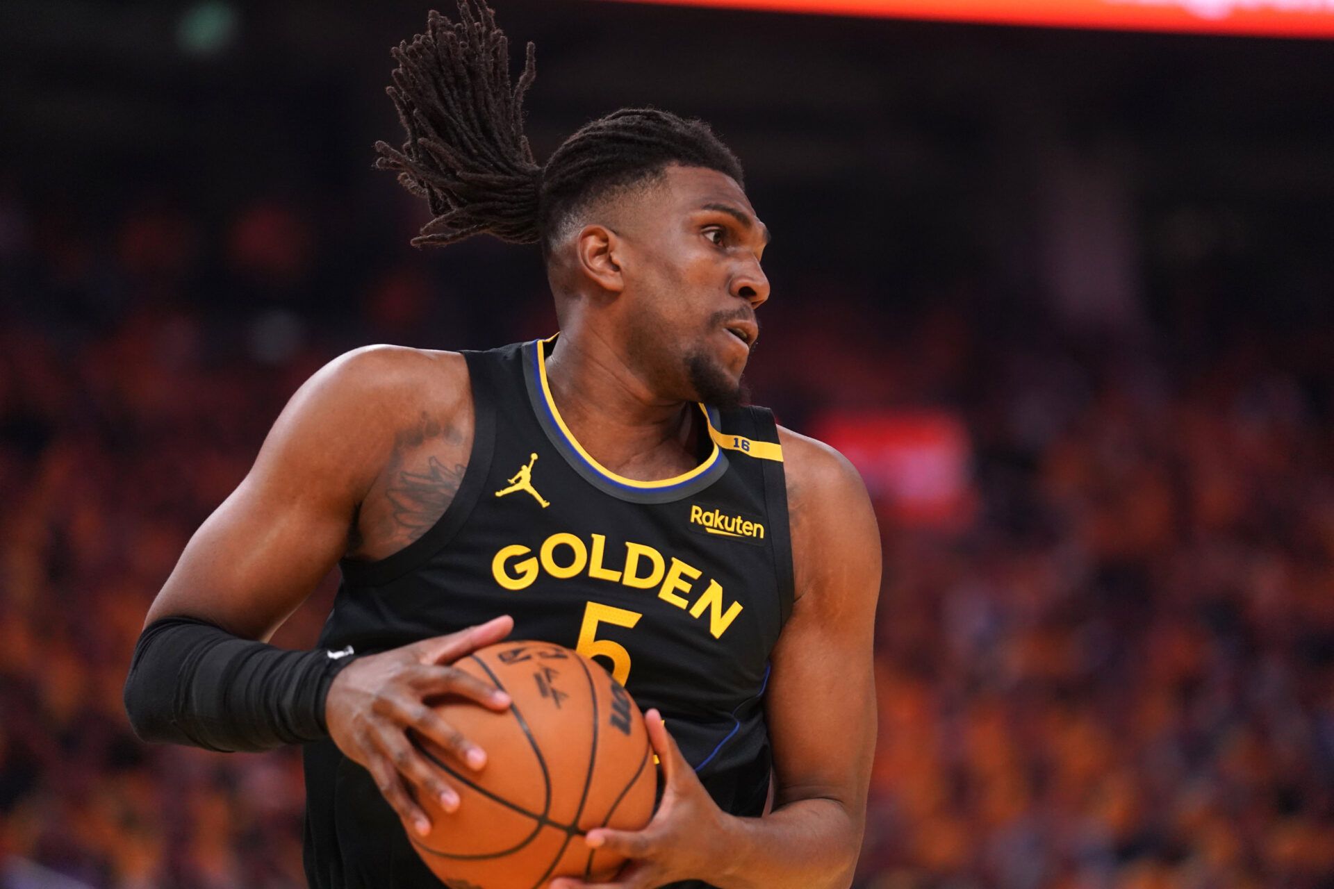 Golden State Warriors forward Kevon Looney (5) holds onto a rebound against the Minnesota Timberwolves in the first quarter during game four of the second round for the 2025 NBA Playoffs at Chase Center.