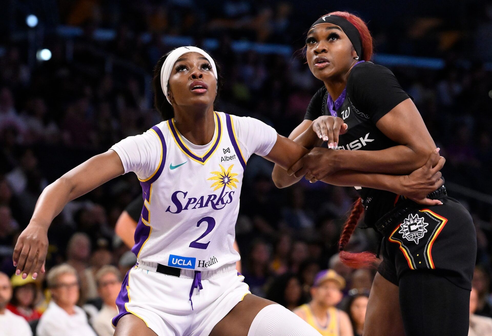 Los Angeles Sparks forward Rickea Jackson (2) and Connecticut Sun forward Aneesah Morrow (24) jockey for rebounding position during the second quarter at Crypto.com Arena.