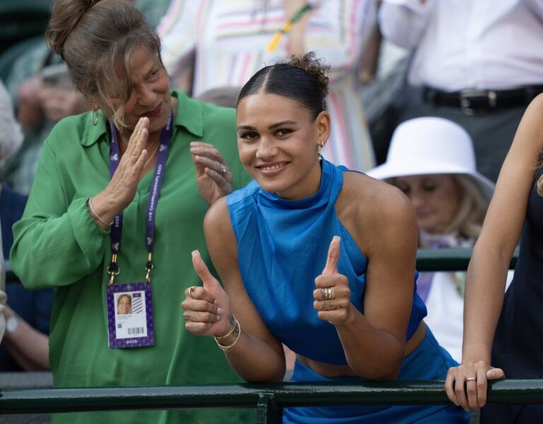 Trinity Rodman reacts to Ben Shelton of the United States winning his match against Lorenzo Sonego of Italy on day eight at All England Lawn Tennis and Croquet Club.