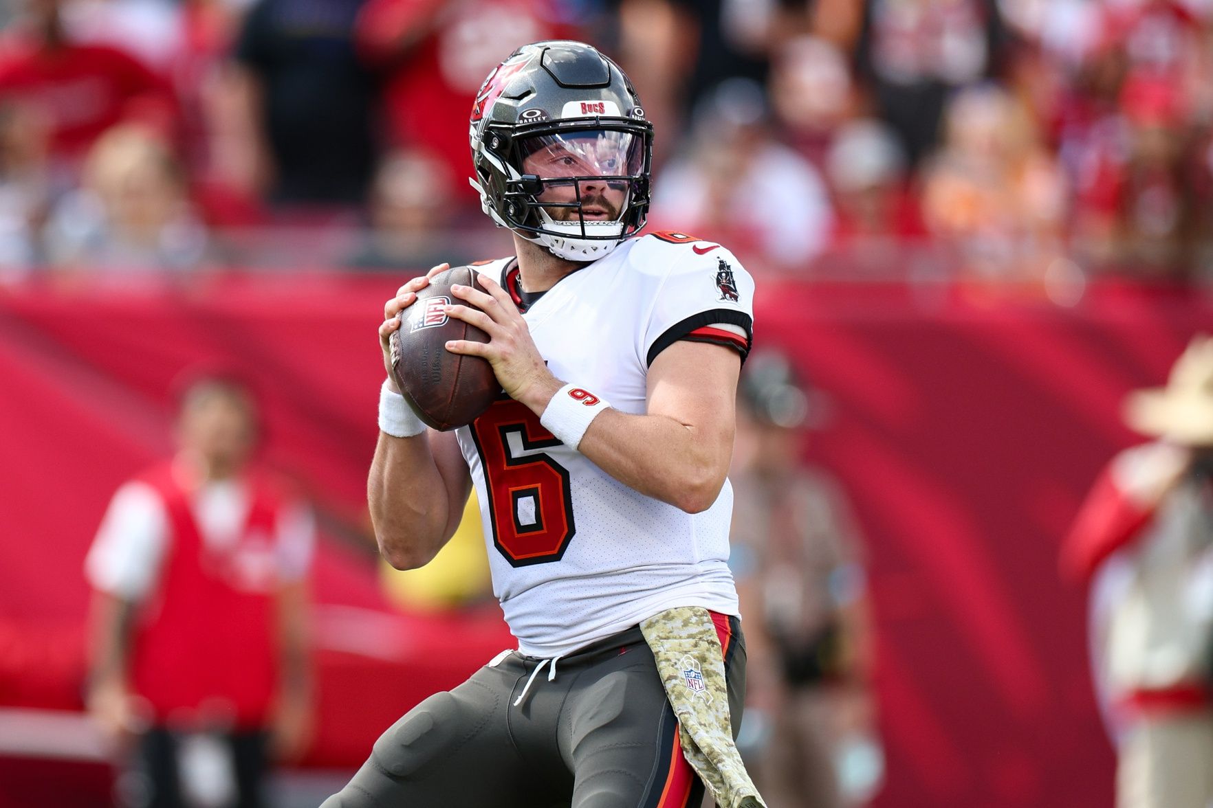Tampa Bay Buccaneers quarterback Baker Mayfield (6) drops back to pass against the San Francisco 49ers in the first quarter at Raymond James Stadium.
