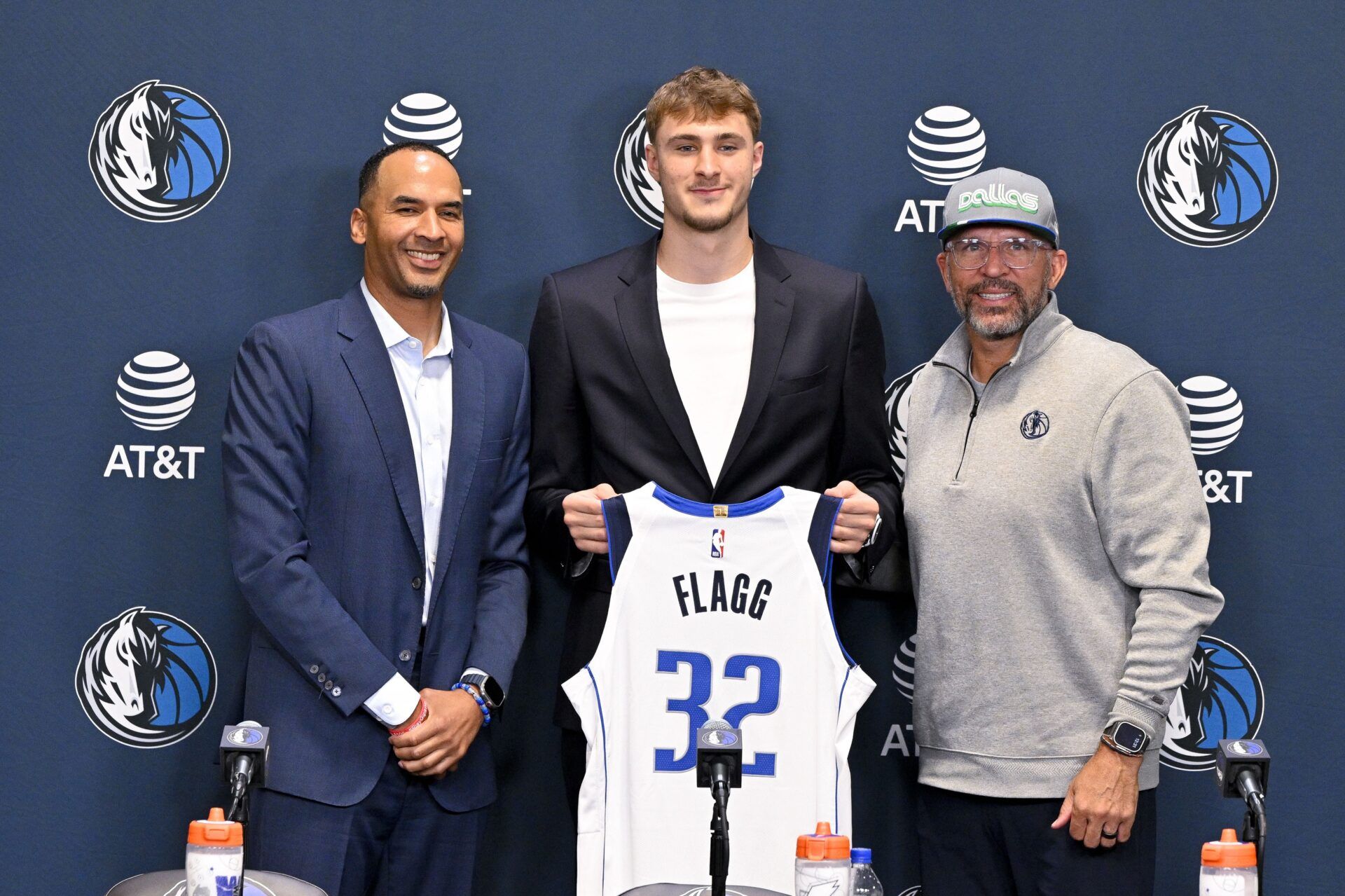 (from left) Dallas Mavericks general manager Nico Harrison and Mavericks first overall pick Cooper Flagg and head coach Jason Kidd pose for a photo at the Dallas Mavericks Practice Facility.