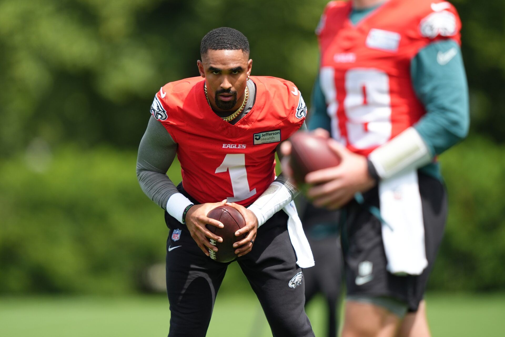 Philadelphia Eagles quarterback Jalen Hurts (1) performs a practice drill at NovaCare Complex.