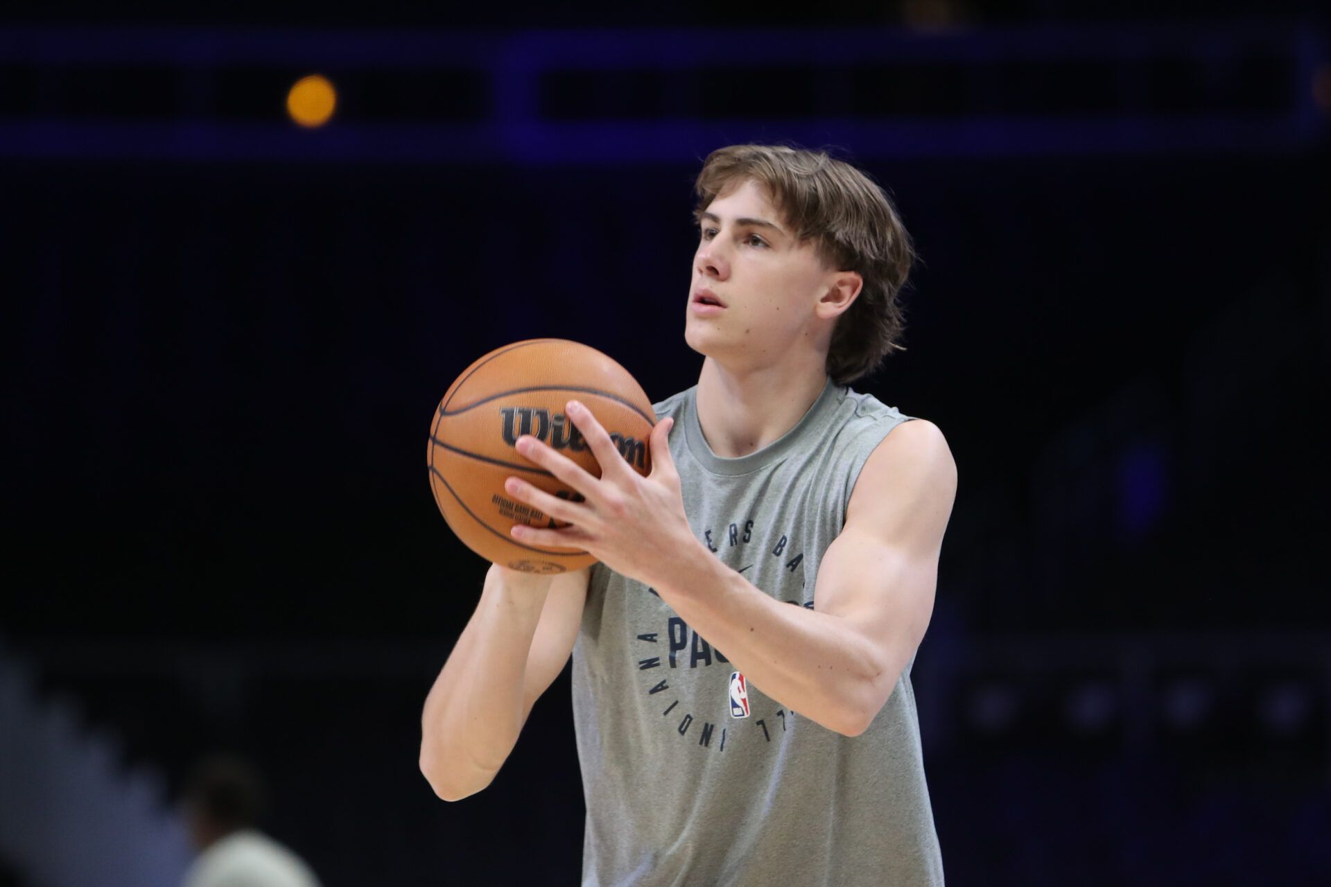 Indiana Pacers forward Johnny Furphy (12) warms up on the court before the game against the Atlanta Hawks at State Farm Arena.