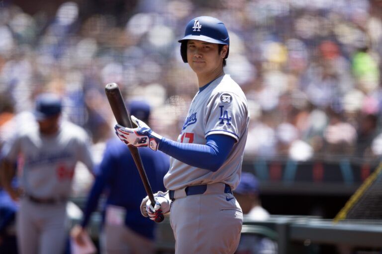 Los Angeles Dodgers designated hitter Shohei Ohtani (17) awaits his turn at bat against the San Francisco Giants during the first inning at Oracle Park.
