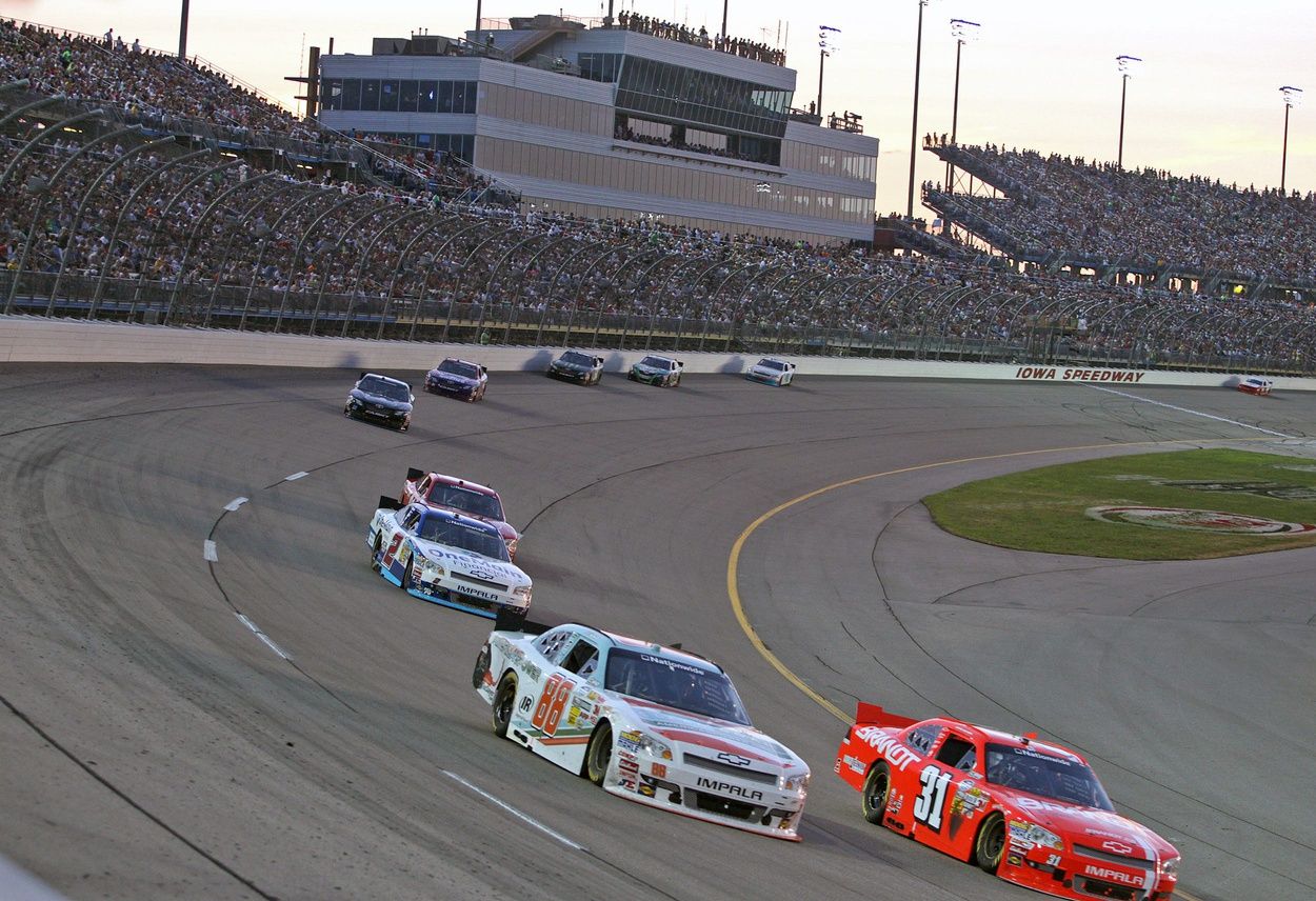 Justin Allgaier, in the #31 orange car to far bottom right, was the leader at the 175 Lap mark during the U.S. Cellular 250 NASCAR Nationwide race at the Iowa Speedway in Newton on Saturday night Aug. 4th, 2012. IMAGN