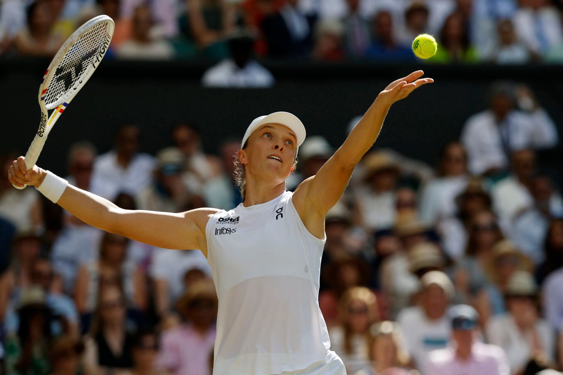 Iga Swiatek (POL) serves against Amanda Anisimova (USA)(not pictured) in the ladies' singles championship on day thirteen of The Championships Wimbledon 2025 at All England Lawn Tennis and Croquet Club.