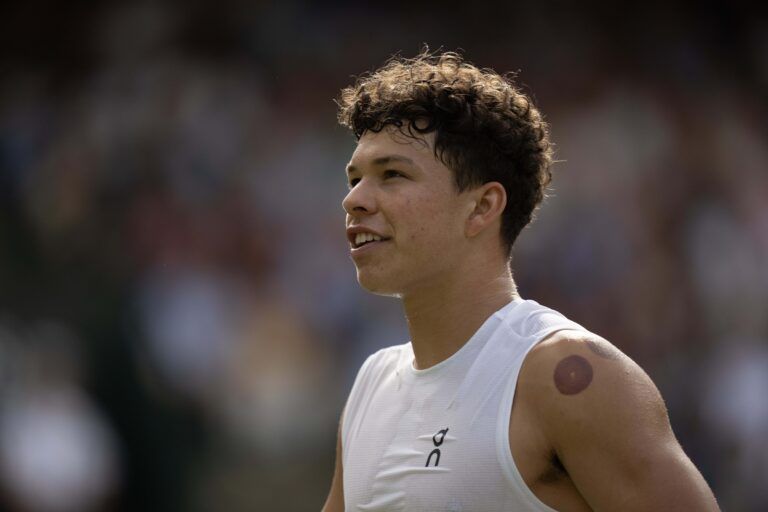 Ben Shelton of the United States during his match against Jannik Sinner of Italy on day 10 at All England Lawn Tennis and Croquet Club.
