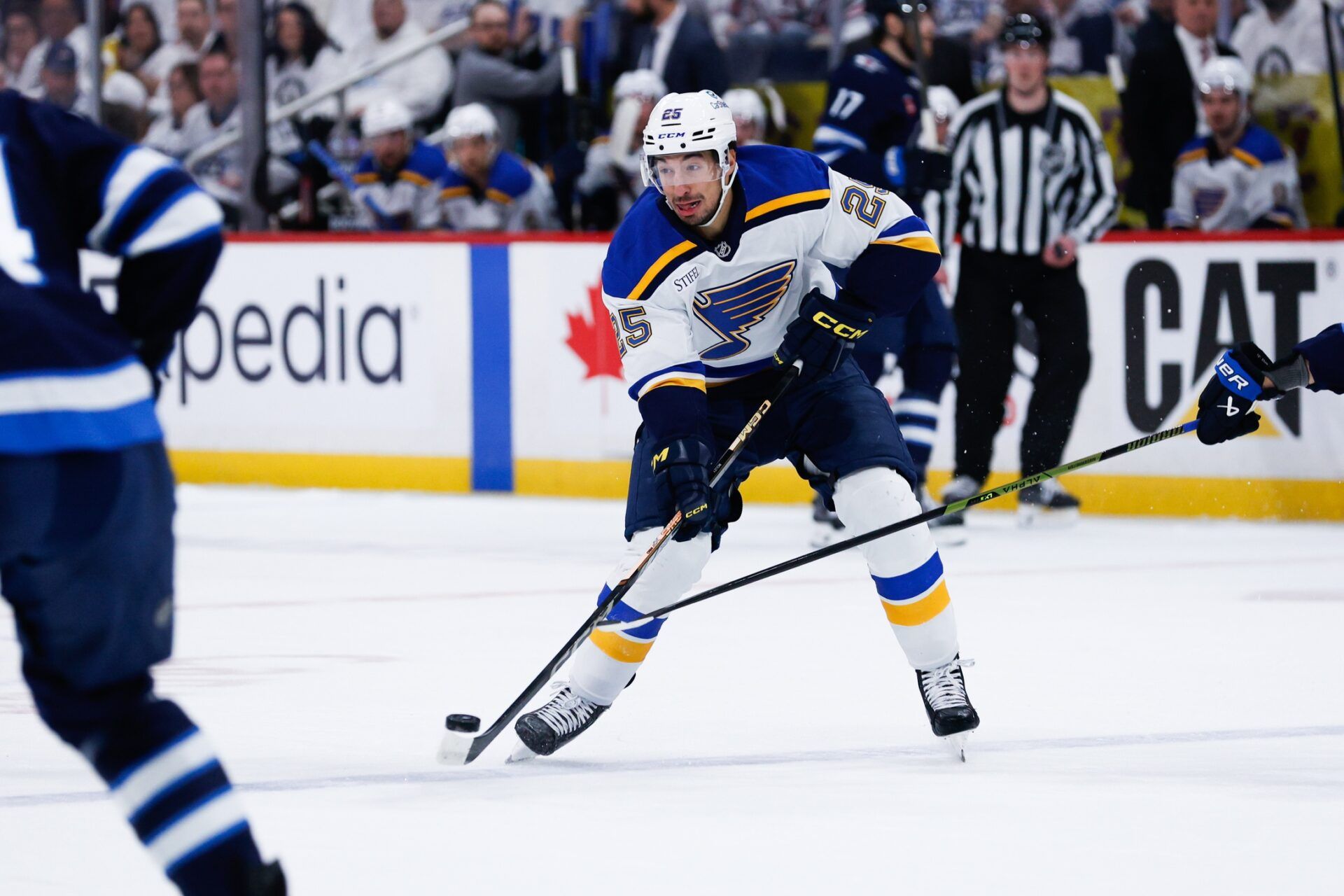 St. Louis Blues forward Jordan Kyrou (25) skates into the Winnipeg Jets zone during the first period in game five of the first round of the 2025 Stanley Cup Playoffs at Canada Life Centre.