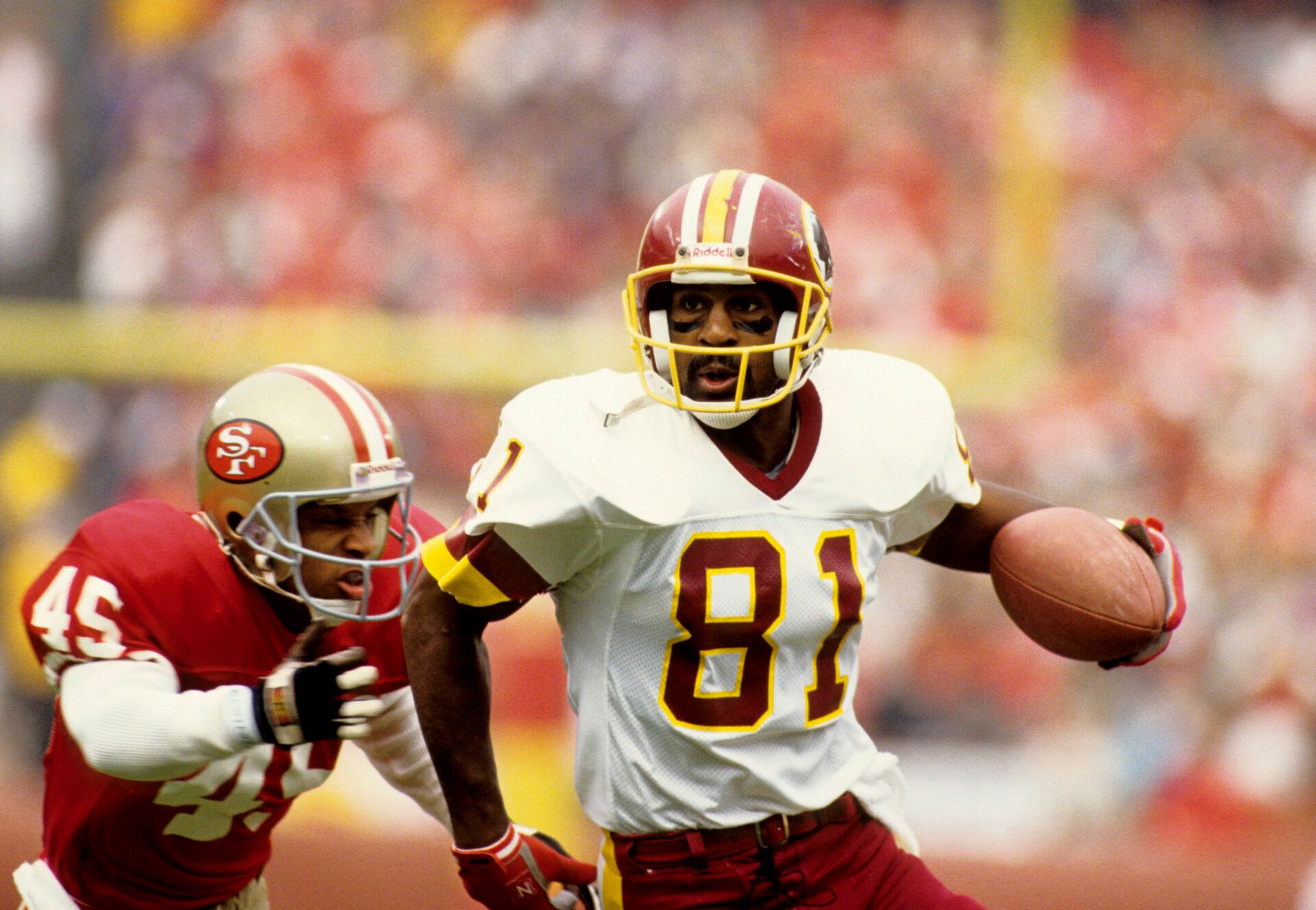 Sep 16, 1990, USA; FILE PHOTO; Washington Redskins receiver #81 Art Monk eludes San Francisco 49ers defensive back Kevin Lewis (45).