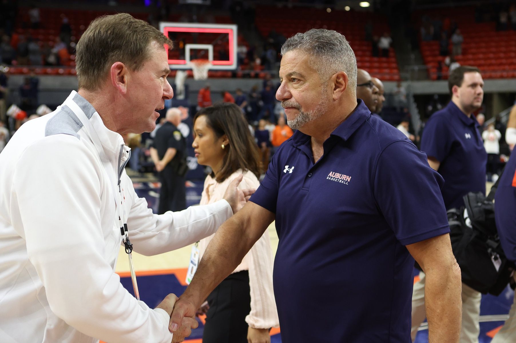 Auburn Tigers athletic director John Cohen congratulates Bruce Pearl after beating the Missouri Tigers at Neville Arena. Pearl now has 213 wins at Auburn and is tied with Joel Eaves as the winningest coach in Auburn history.