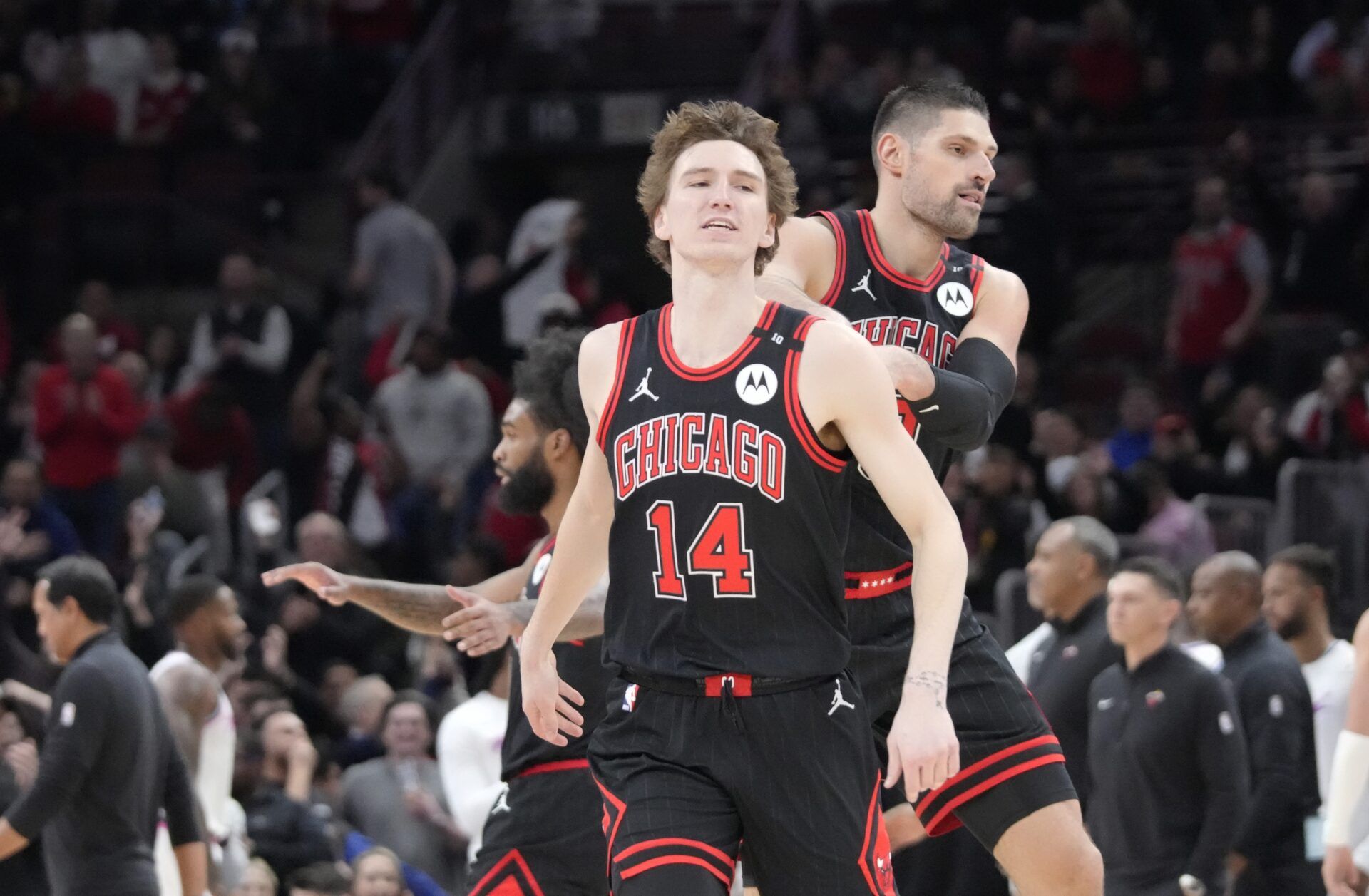 Chicago Bulls forward Matas Buzelis (14) celebrates his three point basket against the Miami Heat during the second half at United Center.
