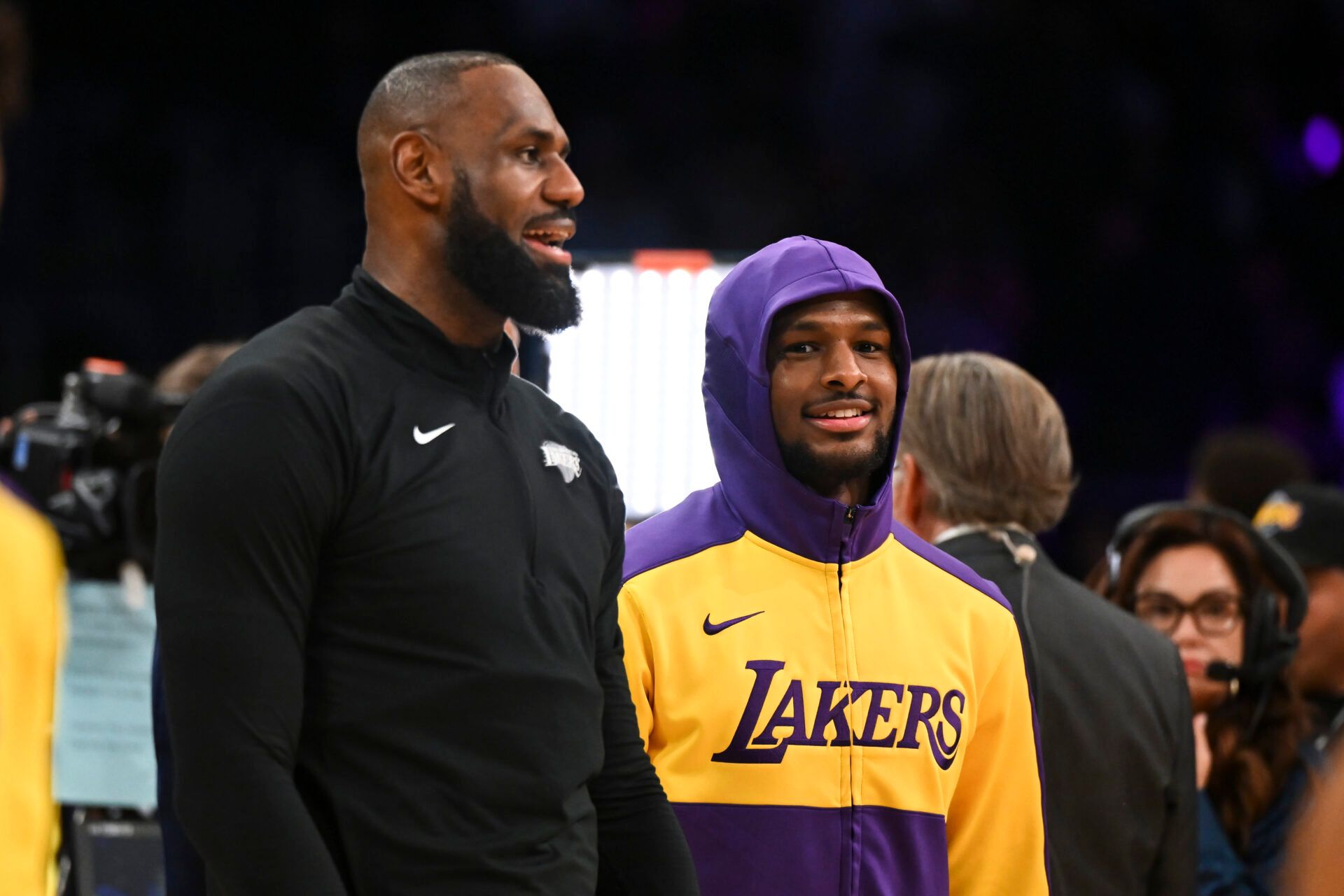 Los Angeles Lakers guard Bronny James (9) and forward LeBron James (23) warming up before the game against the Phoenix Suns at Crypto.com Arena.