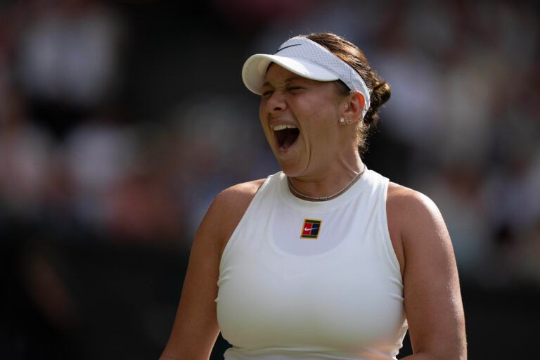 Amanda Anisimova of the United States reacts to a point during the women’s final match against Iga Swiatek of Poland on day 13 at All England Lawn Tennis and Croquet Club.
