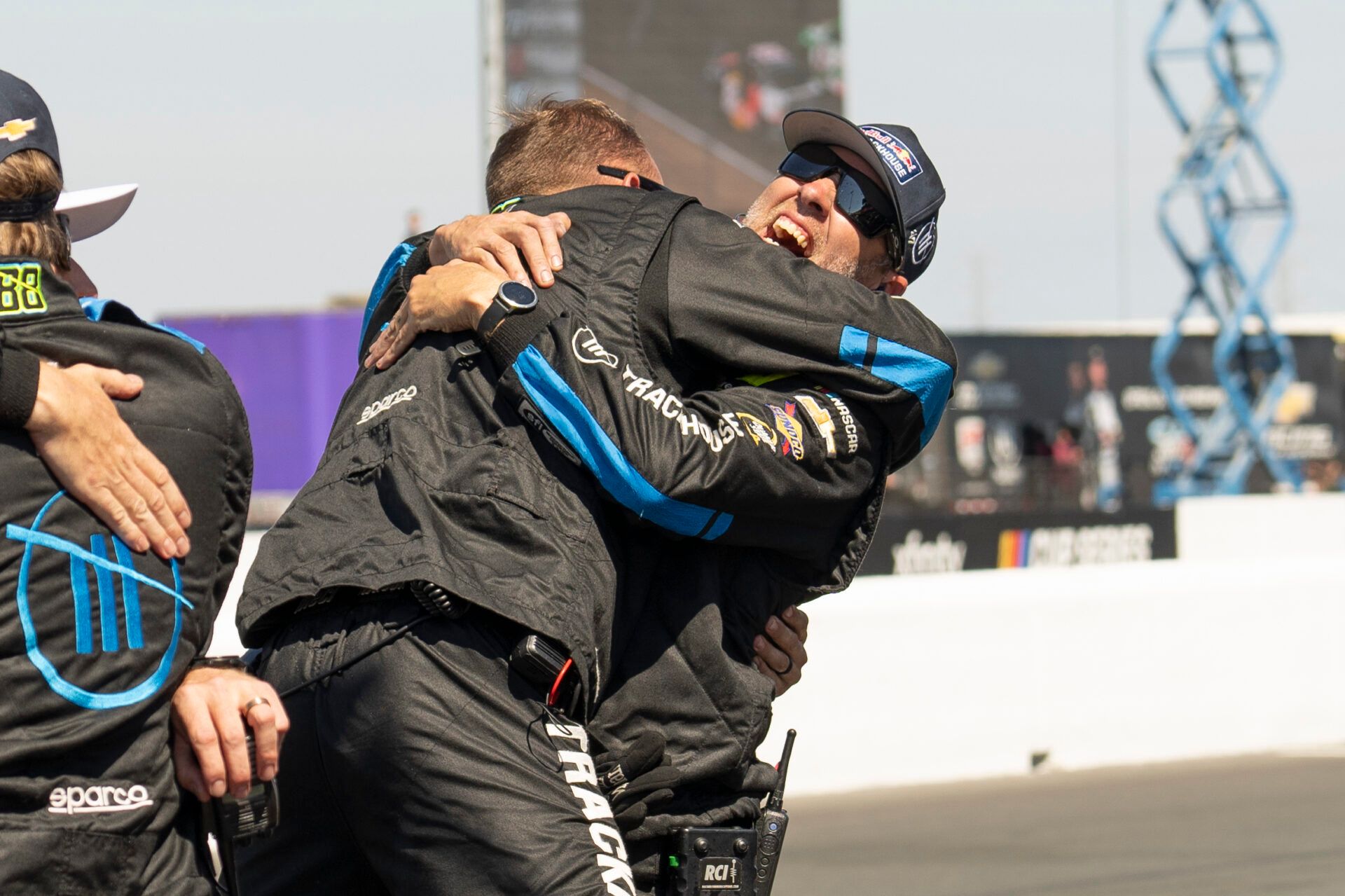 Crew members for NASCAR Cup Series driver Shane van Gisbergen (not pictured) react after winning the NASCAR Toyota / Save Mart 350 at Sonoma Raceway.