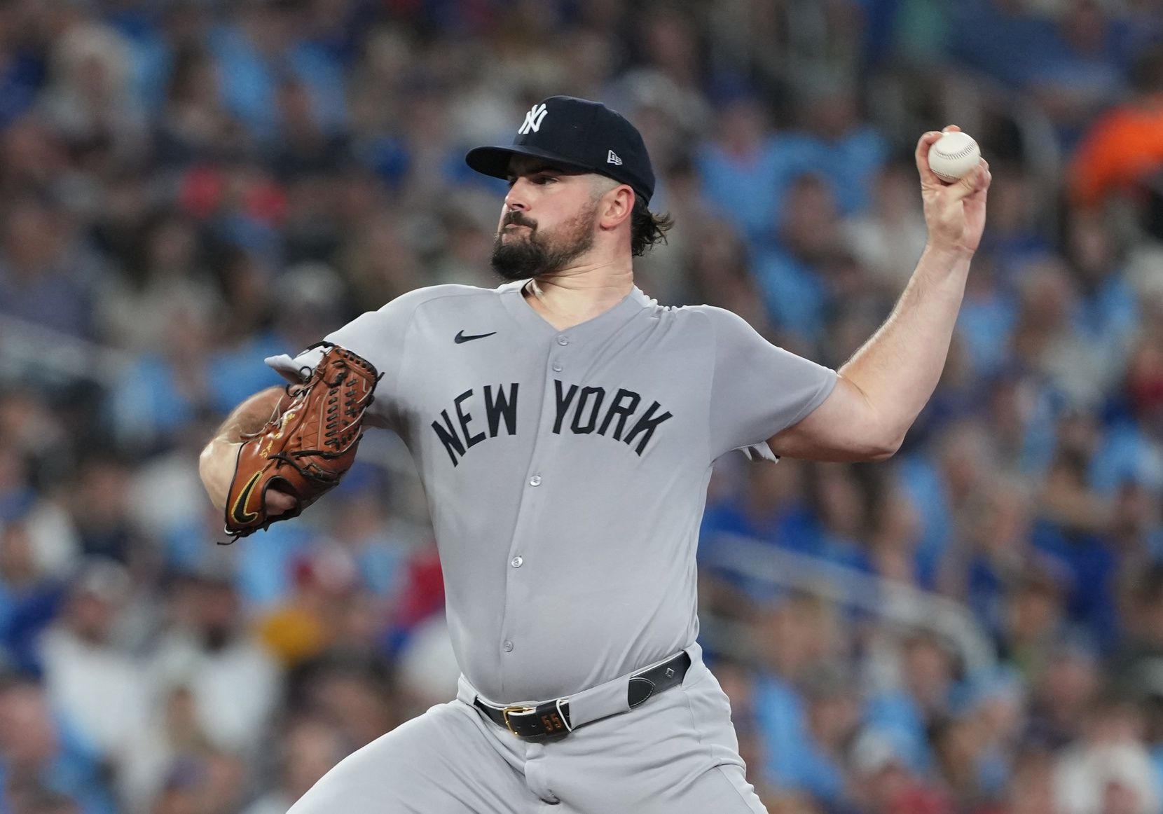 New York Yankees starting pitcher Carlos Rodon (55) throws a pitch against the Toronto Blue Jays during the first inning at Rogers Centre.