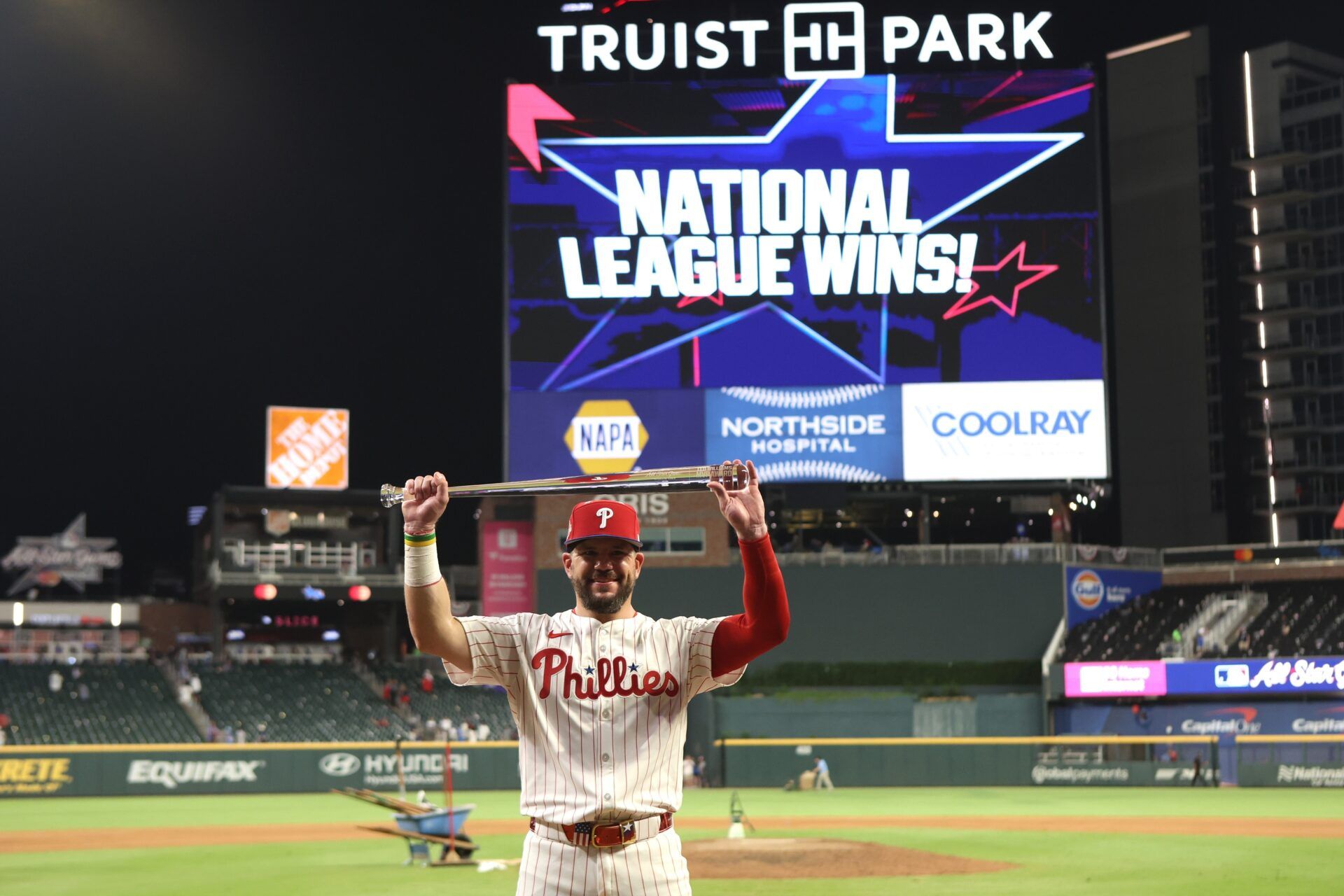 National League designated hitter Kyle Schwarber (12) of the Philadelphia Phillies celebrates after defeating the American League in the 2025 MLB All Star Game at Truist Park.