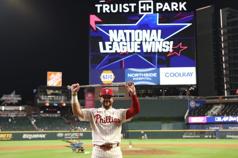 National League designated hitter Kyle Schwarber (12) of the Philadelphia Phillies celebrates after defeating the American League in the 2025 MLB All Star Game at Truist Park.