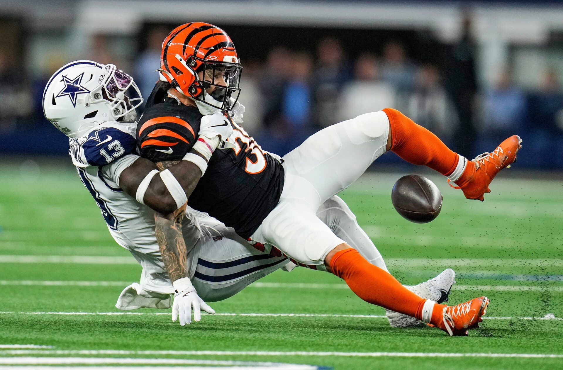 Dallas Cowboys linebacker DeMarvion Overshown takes down Cincinnati Bengals running back Chase Brown (30) Monday Night Football at AT&T Stadium in Arlington,Texas on Monday, December 9, 2024.