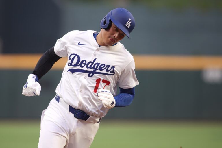 National League designated hitter Shohei Ohtani (17) of the Los Angeles Dodgers runs home to score in the first inning against the American League during the 2025 MLB All Star Game at Truist Park.