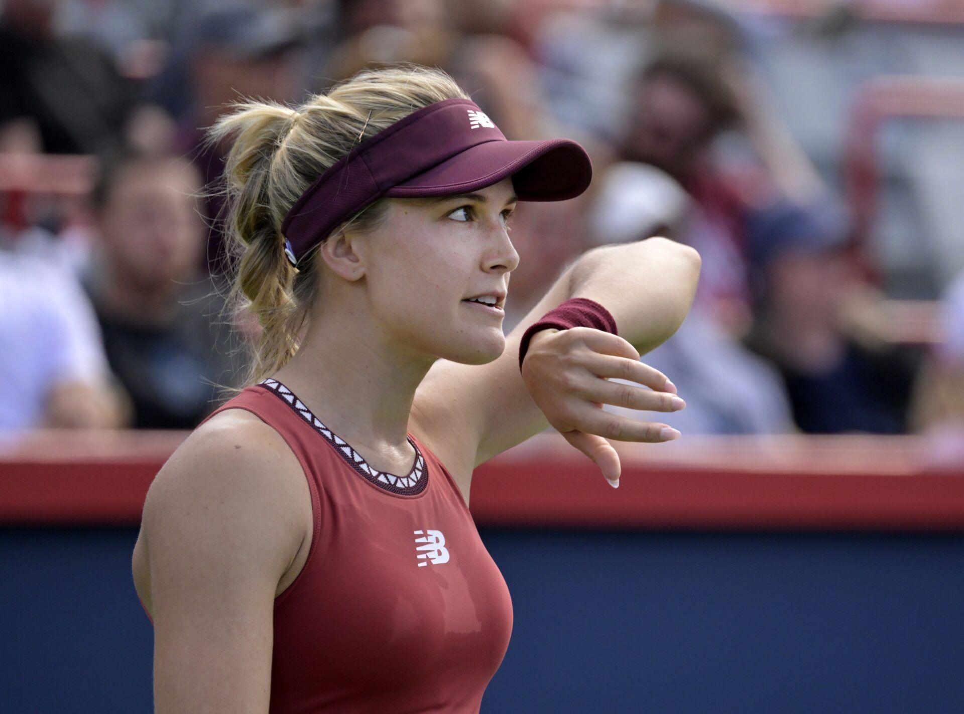Eugenie Bouchard (CAN) reacts after losing a point against Danielle Collins (USA) (not pictured) in first round qualifying play at IGA Stadium.