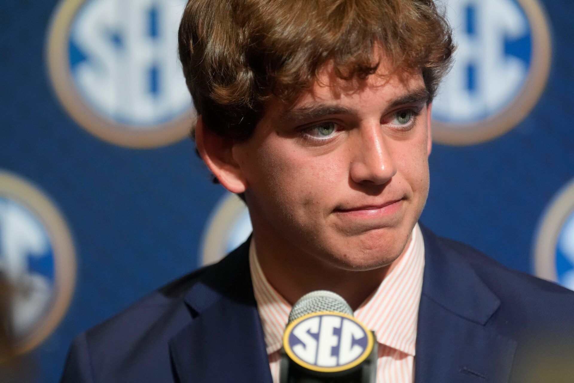 Texas quarterback Arch Manning listens to a question during SEC Media Days at the College Football Hall of Fame in Atlanta.
