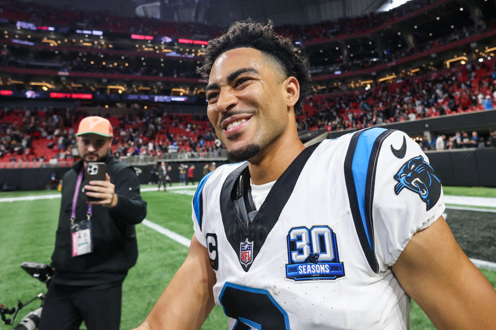 Carolina Panthers quarterback Bryce Young (9) celebrates after a victory over the Atlanta Falcons in overtime at Mercedes-Benz Stadium.